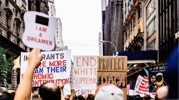 Signs promoting immigrant rights