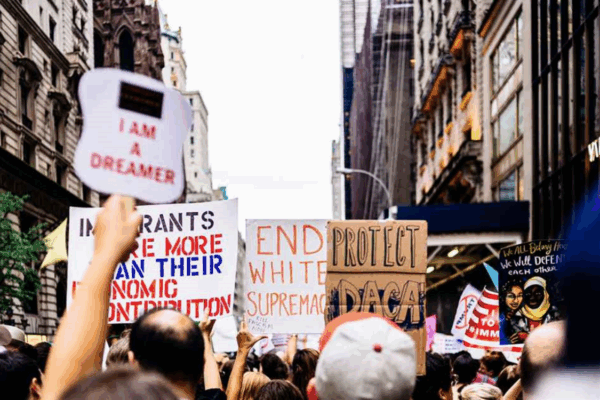 Signs promoting immigrant rights