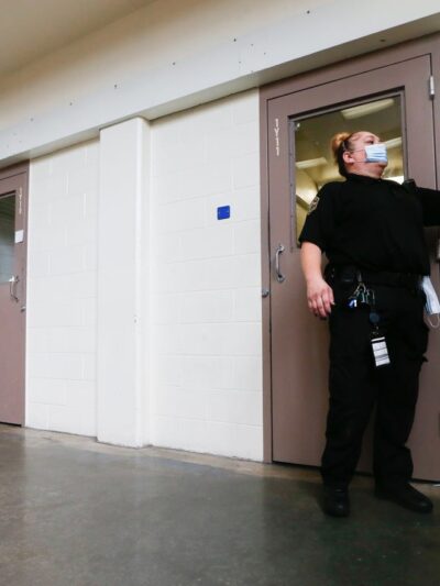 A guard at Shawnee County Jail makes routine rounds