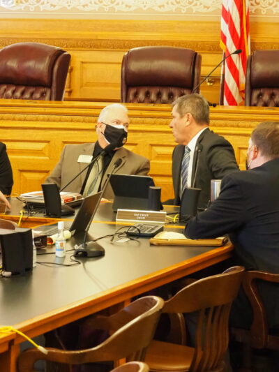 The Kansas House joined with the Kansas Senate to override Gov. Laura Kelly’s veto of a congressional redistricting map for use in the 2022 election cycle. In the House, the partisan work on redistricting is led by Republican Rep. Chris Croft, right, and