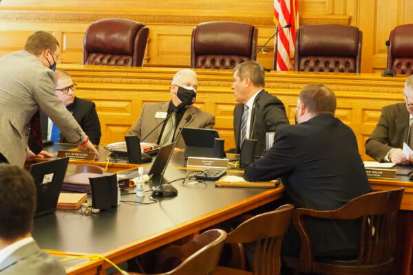 The Kansas House joined with the Kansas Senate to override Gov. Laura Kelly’s veto of a congressional redistricting map for use in the 2022 election cycle. In the House, the partisan work on redistricting is led by Republican Rep. Chris Croft, right, and