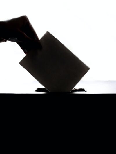 Ballot being dropped into ballot box