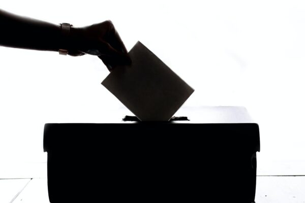 Ballot being dropped into ballot box