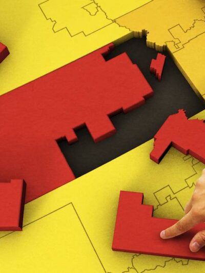 Picture of the state of Kansas as a puzzle being put together