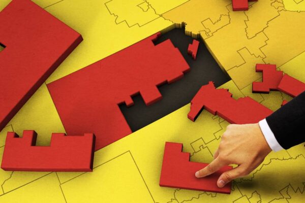 Picture of the state of Kansas as a puzzle being put together