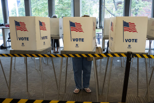 A voter fills out an advance ballot on July 29, 2022, at the Shawnee County Elections Office. (Sherman Smith/Kansas Reflector)