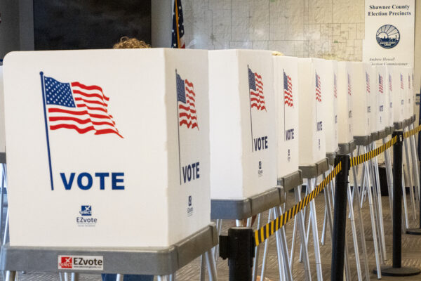 Voting booths stand side by side on July 29, 2022, at the Shawnee County Elections Office. (Sherman Smith/Kansas Reflector)