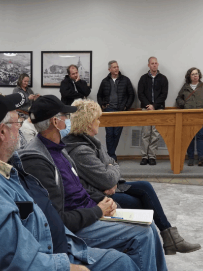 St. Marys residents line the walls to listen to the discussion of the library’s lease renewal during a Nov. 15, 2022, city commission meeting. (Rachel Mipro/Kansas Reflector)