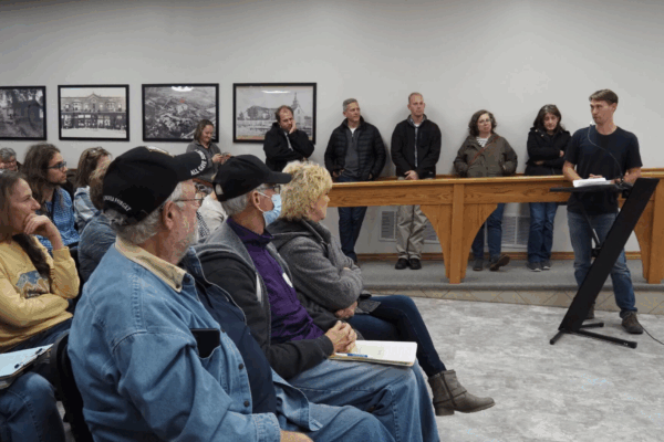 St. Marys residents line the walls to listen to the discussion of the library’s lease renewal during a Nov. 15, 2022, city commission meeting. (Rachel Mipro/Kansas Reflector)
