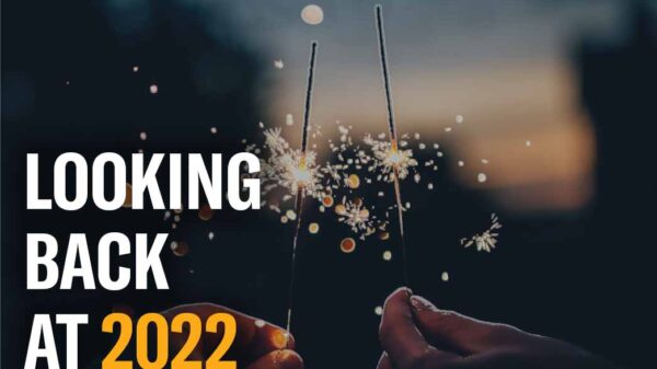 People holding sparklers, copy reads "Looking back at 2022"