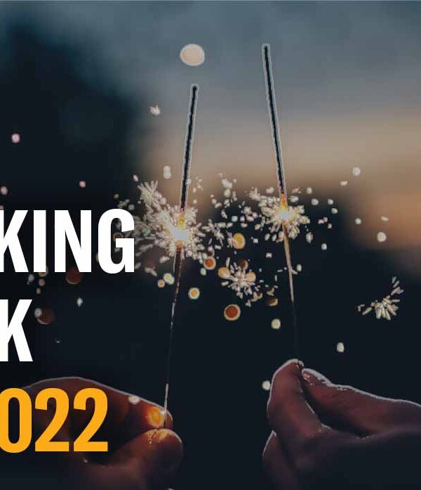 People holding sparklers, copy reads "Looking back at 2022"