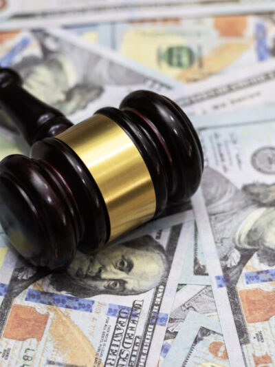 gavel on top of money