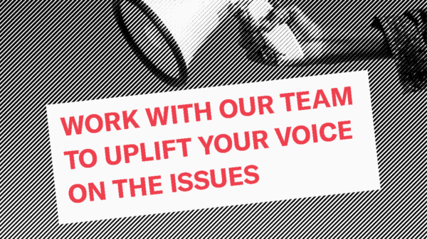 black and white photo of megaphone held by hand