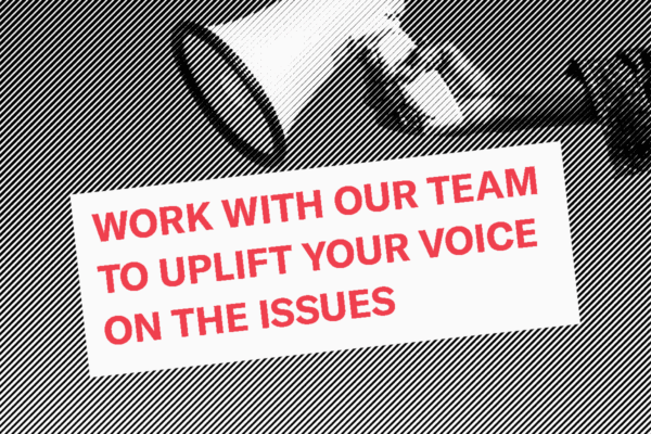black and white photo of megaphone held by hand