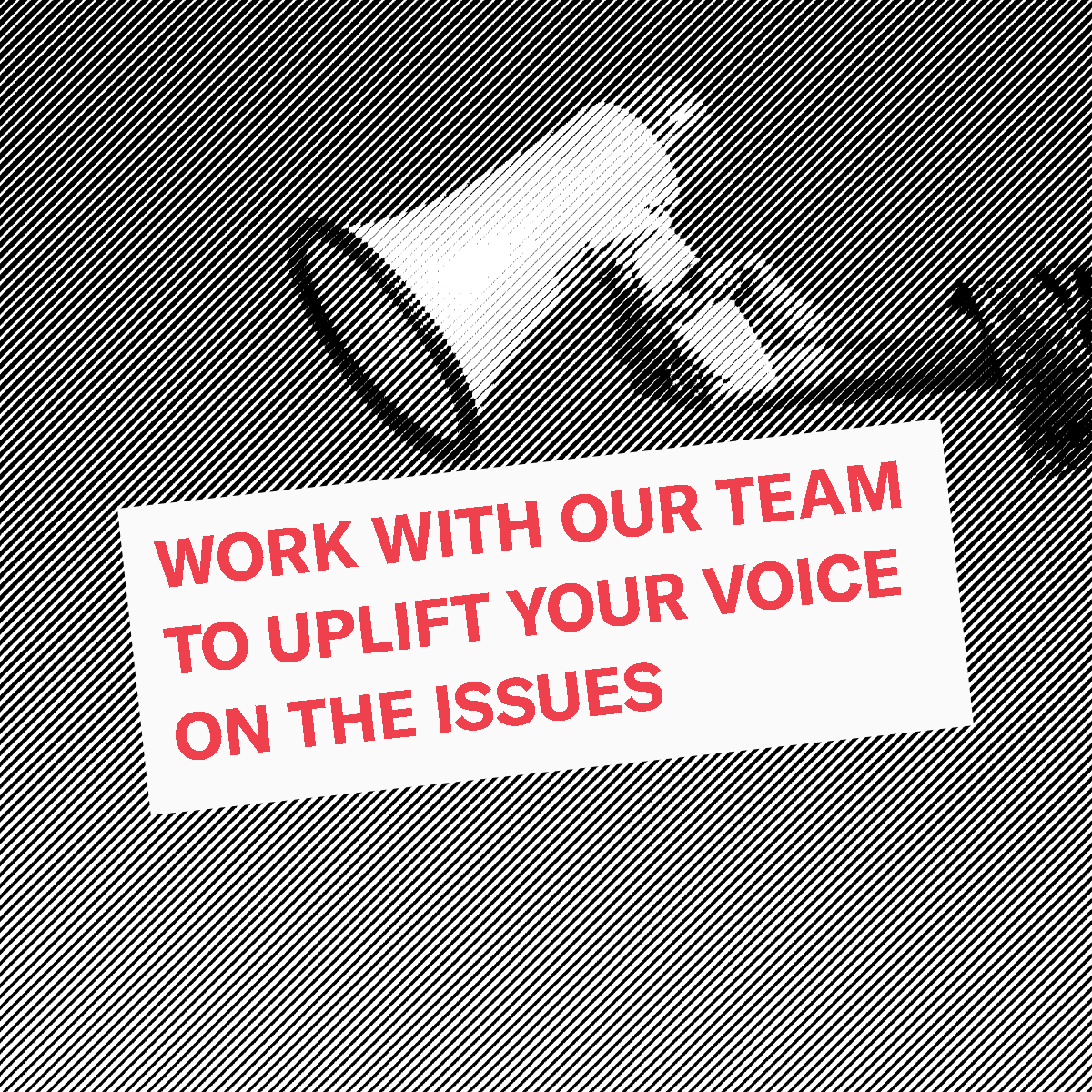 black and white photo of megaphone held by hand