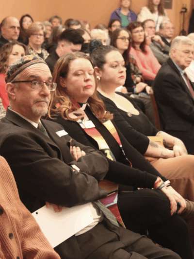 Few empty seats remained as supporters and opponents of the bill packed into the committee room.