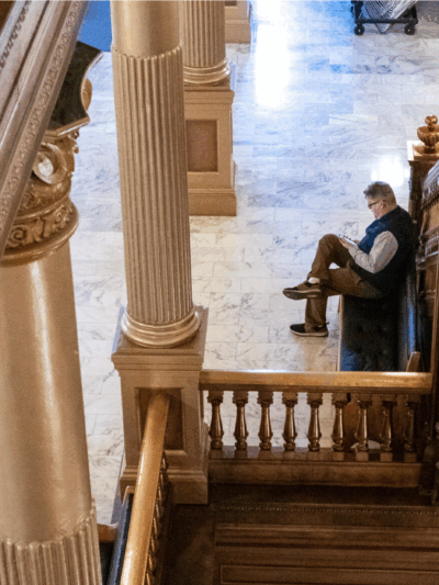 Kansas Reflector opinion editor Clay Wirestone works Thursday at the Statehouse in Topeka. (Sherman Smith/Kansas Reflector)