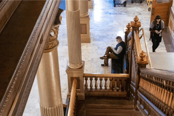 Kansas Reflector opinion editor Clay Wirestone works Thursday at the Statehouse in Topeka. (Sherman Smith/Kansas Reflector)