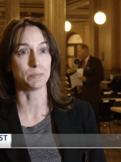 Screen of Aileen Berquist, Director of Policy from news segment