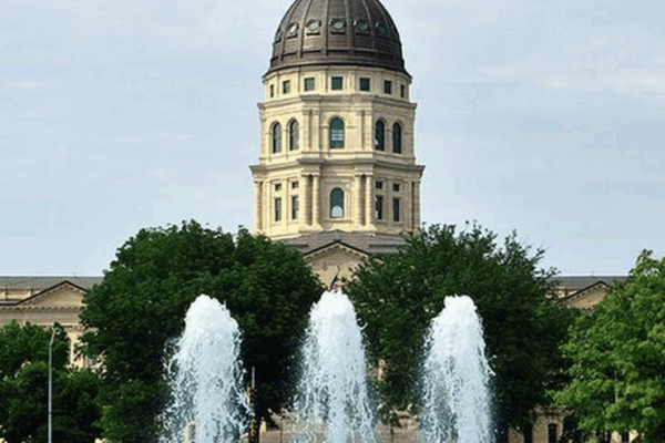 Kansas State Capitol Building with Fountains on a Sunny Day