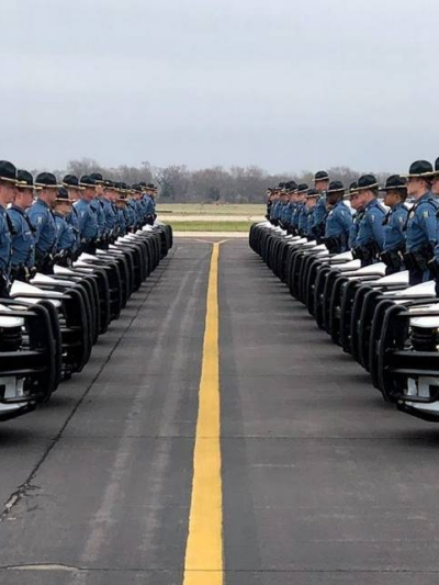 kansas highway patrol officers lined up with cars