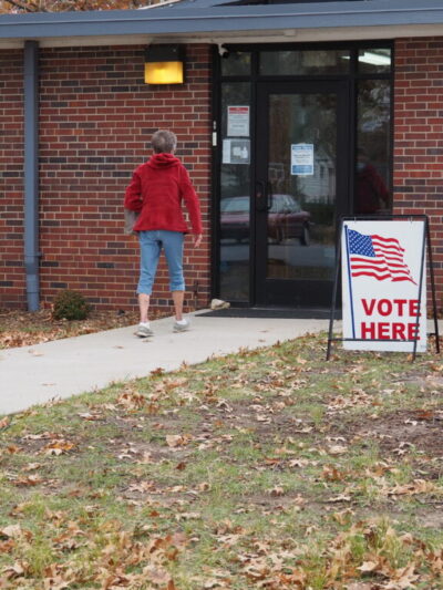 voter at a poll kansas reflector