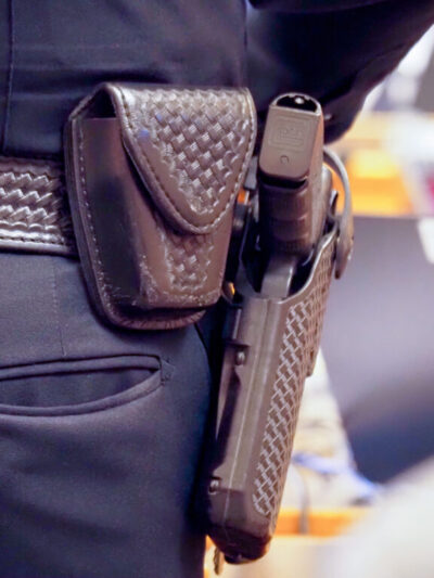 gun on hip of officer