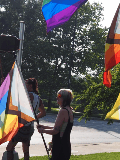 Ahead of SB 180’s implementation, Lawrence campaigners lobby for the city to be made into a sanctuary city for transgender Kansans on June 20, 2023. (Rachel Mipro/Kansas Reflector)