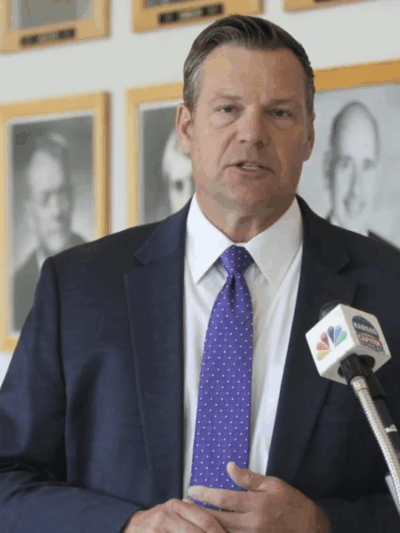 Kansas Attorney General Kris Kobach answers questions from reporters during a news conference outside his office, Monday, May 1, 2023, in Topeka, Kan. (AP Photo/John Hanna, File)