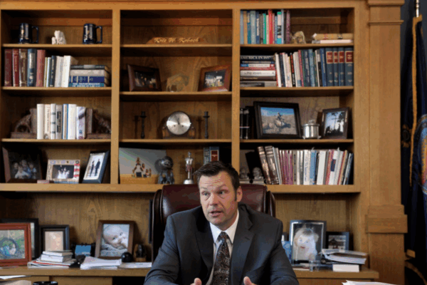 Left: FILE PHOTO: Former Kansas Secretary of State Kris Kobach in his Topeka, Kansas, office May 12, 2016. Photo by Dave Kaup/REUTERS