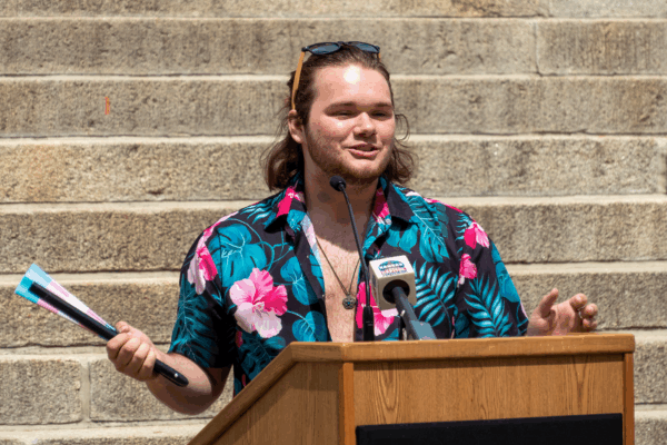 Adam Kellogg speaks during rally in support of transgender rights May 5, 2023, at the Statehouse in Topeka. Kellogg is one of the five transgender Kansan's represented by the ACLU in a case involving gender markers on driver's licenses. (Sherman Smith/Kan