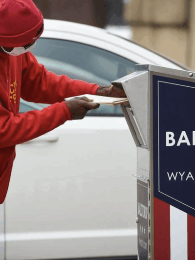 A voter drops off their ballot at a drop box in Wyandotte County during the 2020 election. TAMMY LJUNGBLAD tljungblad@kcstar.com  Read more at: https://www.kansascity.com/news/local/article279738504.html#storylink=cpy