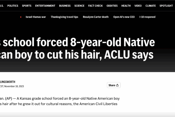 Screenshot of AP article, headline is "Kansas school forced 8-year-old Native American boy to cut his huir, ACLU says"
