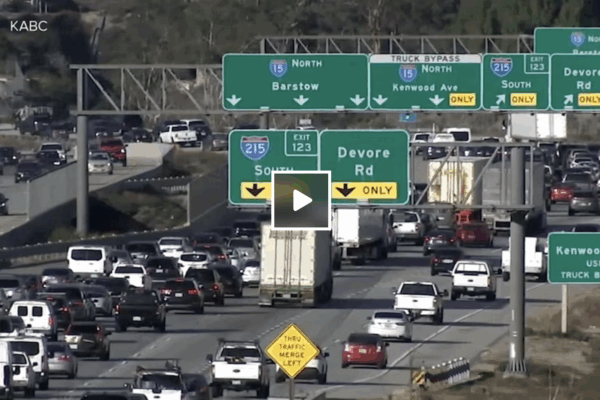 Screenshot of a video newstory; cars in traffic on Kansas highway
