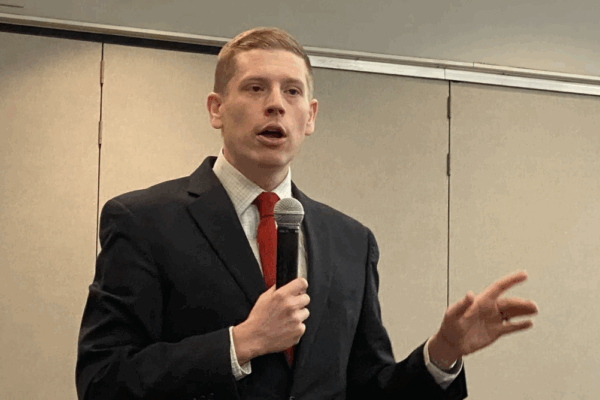 Dr. Micah Kubic spoke at the Reno County Democrats’ monthly meeting at Hutchinson Community College. Kubic spoke on a number of issues concerning voting rights in the state. CREDIT GREG HOLMES