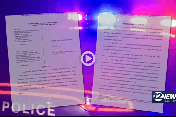 Thumbnail of news video showing papers of settlement