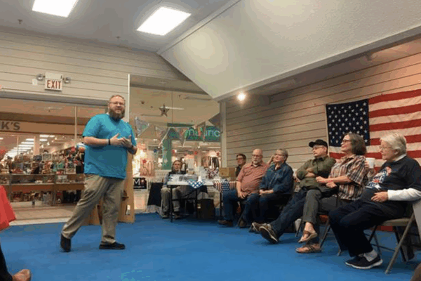 FILE - In this Monday, Oct. 22, 2018, file photo, Ford County Democratic Party chairman Johnny Dunlap speaks about the party's get-out-the-vote efforts during a meeting of volunteers in Dodge City, Kan. (Jonathan Shorman/The Wichita Eagle via AP)