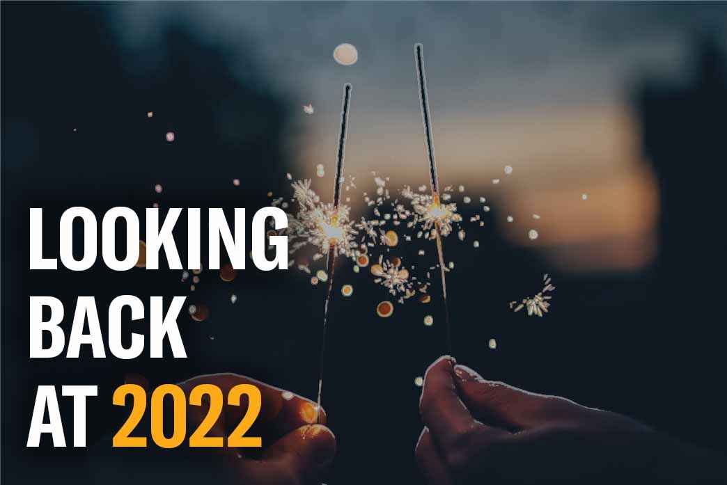 People holding sparklers, copy reads "Looking back at 2022"
