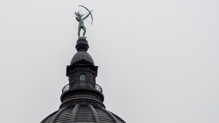 The Ad Astra statue atop the Statehouse aims for a brighter tomorrow on a gloomy Jan. 24, 2023. (Sherman Smith/Kansas Reflector)