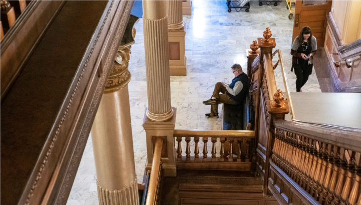Kansas Reflector opinion editor Clay Wirestone works Thursday at the Statehouse in Topeka. (Sherman Smith/Kansas Reflector)