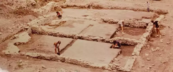 Workers handle preservation duties duringa 1980s excavation of the Quindaro site. They are working on the old J.B. Upson Building, which housed a clothing store and served as offices for the Chindowan newspaper. ( Larry Schmits)