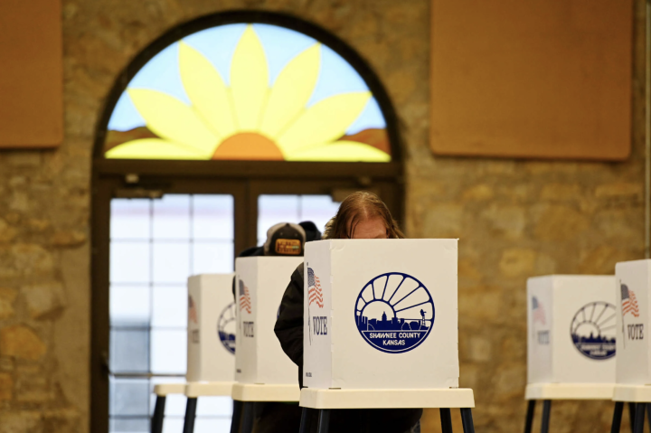 Voters cast their ballots at Heritage Hall on November 8, 2022, in Topeka, Kansas.