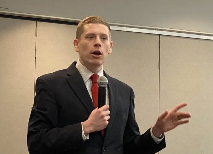 Dr. Micah Kubic spoke at the Reno County Democrats’ monthly meeting at Hutchinson Community College. Kubic spoke on a number of issues concerning voting rights in the state. CREDIT GREG HOLMES