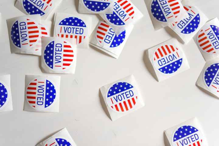Table with an array of "I voted" stickers