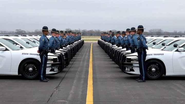 kansas highway patrol officers lined up with cars