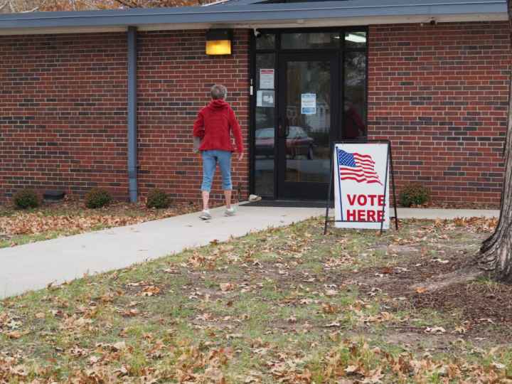 voter at a poll kansas reflector