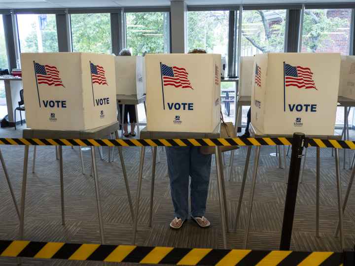  A voter fills out an advance ballot on July 29, 2022, at the Shawnee County Elections Office. (Sherman Smith/Kansas Reflector)