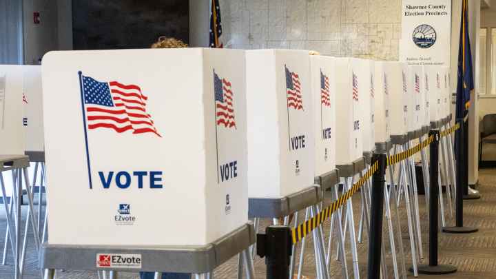  Voting booths stand side by side on July 29, 2022, at the Shawnee County Elections Office. (Sherman Smith/Kansas Reflector)