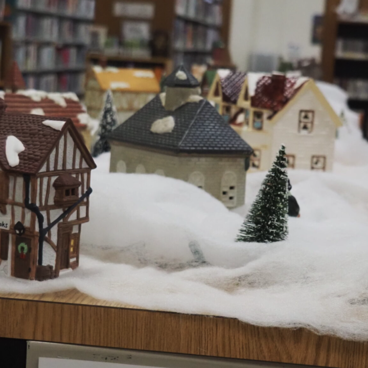 A Christmas village display is set up inside the Pottawatomie Wabaunsee Regional Library. (Rachel Mipro/Kansas Reflector)