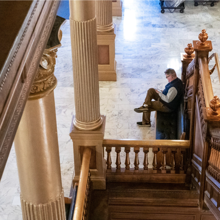 Kansas Reflector opinion editor Clay Wirestone works Thursday at the Statehouse in Topeka. (Sherman Smith/Kansas Reflector)